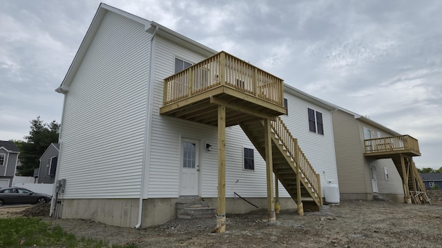 40 Yorktown Rdg, Waterbury, CT 06704 - back of house featuring entry steps, stairs, and a wooden deck