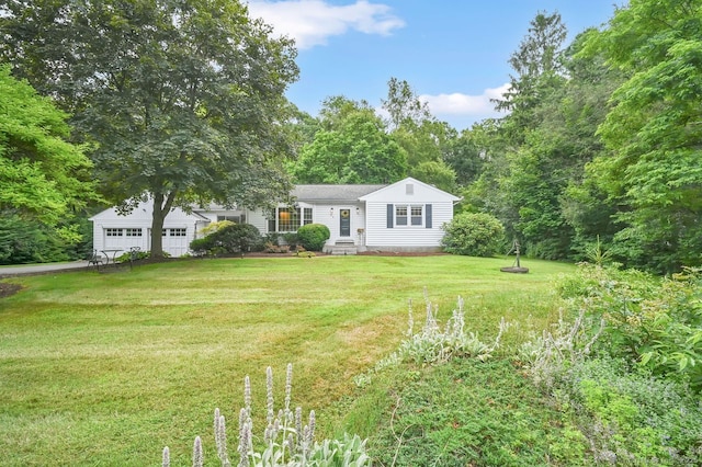 49 Bear Hills Rd, Newtown, CT 06470 - view of front of house featuring a garage and a front lawn