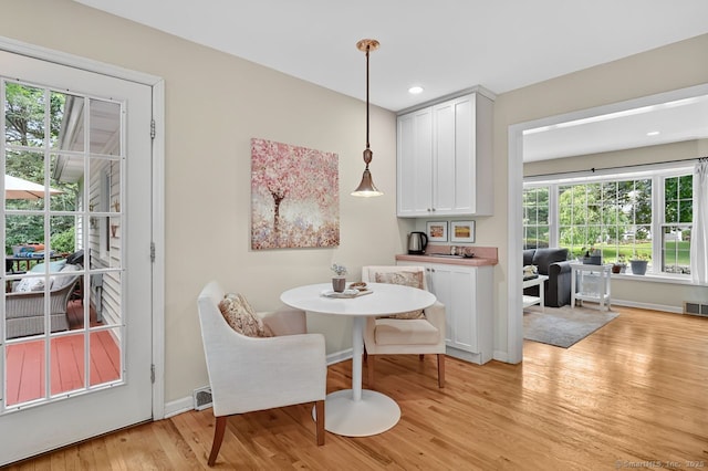 49 Bear Hills Rd, Newtown, CT 06470 - dining space with light wood-type flooring and recessed lighting