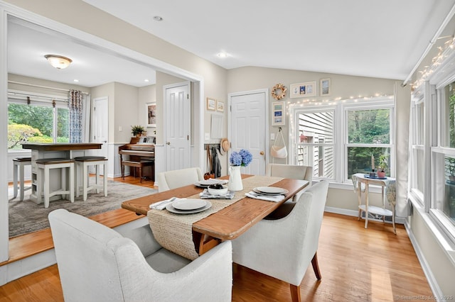 49 Bear Hills Rd, Newtown, CT 06470 - dining room with light wood finished floors, lofted ceiling, and recessed lighting