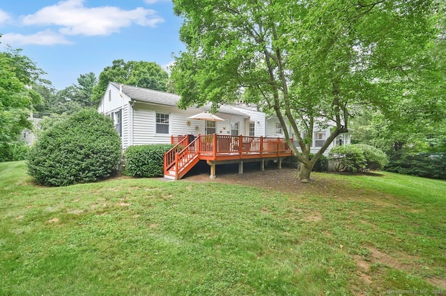 49 Bear Hills Rd, Newtown, CT 06470 - rear view of house featuring a deck and a lawn