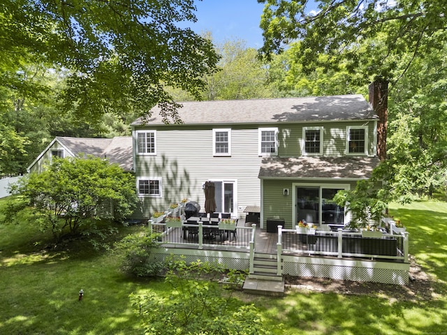 8A Russett Rd, Newtown, CT 06482 - rear view of house with a chimney, a lawn, a deck, a shingled roof, and view of wooded area