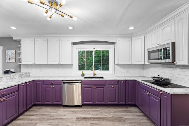 8A Russett Rd, Newtown, CT 06482 - kitchen with stainless steel appliances, a sink, white cabinetry, recessed lighting, and backsplash