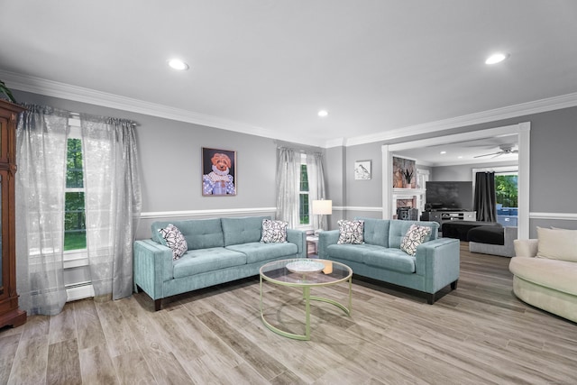 8A Russett Rd, Newtown, CT 06482 - living room with ornamental molding, a fireplace, recessed lighting, wood finished floors, and a baseboard radiator