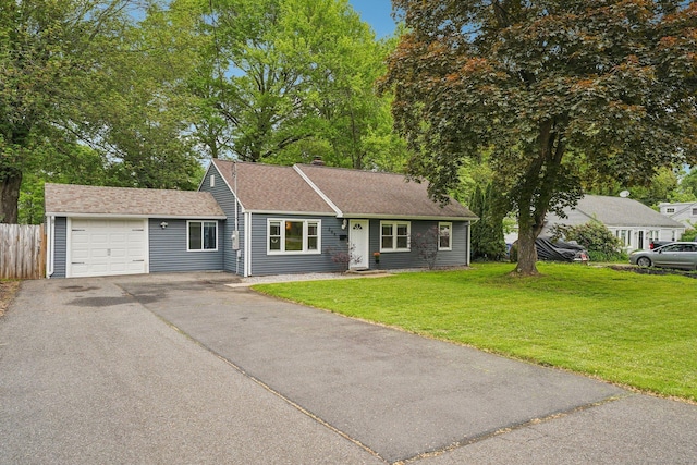 288 Robbins Ave, Newington, CT 06111 - view of front of property featuring driveway, an attached garage, and roof with shingles