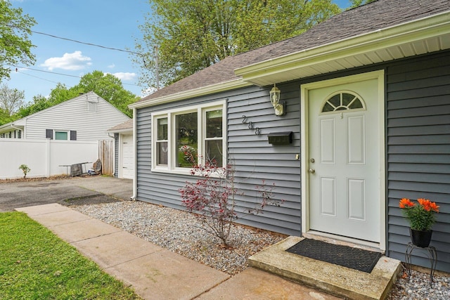 288 Robbins Ave, Newington, CT 06111 - property entrance with roof with shingles