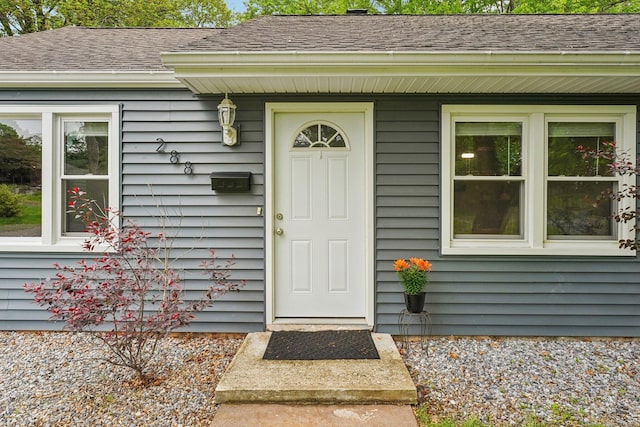 288 Robbins Ave, Newington, CT 06111 - doorway to property with a shingled roof