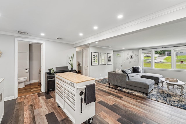 288 Robbins Ave, Newington, CT 06111 - living room featuring ornamental molding, dark wood-style flooring, recessed lighting, and baseboards