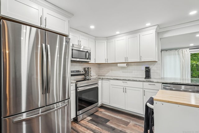 288 Robbins Ave, Newington, CT 06111 - kitchen featuring appliances with stainless steel finishes, wooden counters, dark wood-type flooring, white cabinetry, and recessed lighting