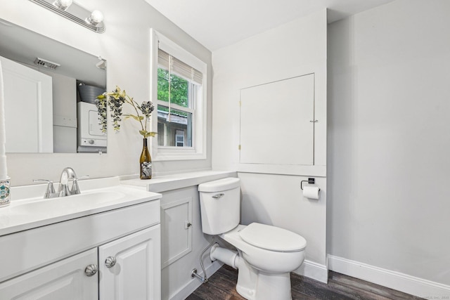 288 Robbins Ave, Newington, CT 06111 - half bath featuring vanity, wood finished floors, toilet, and baseboards