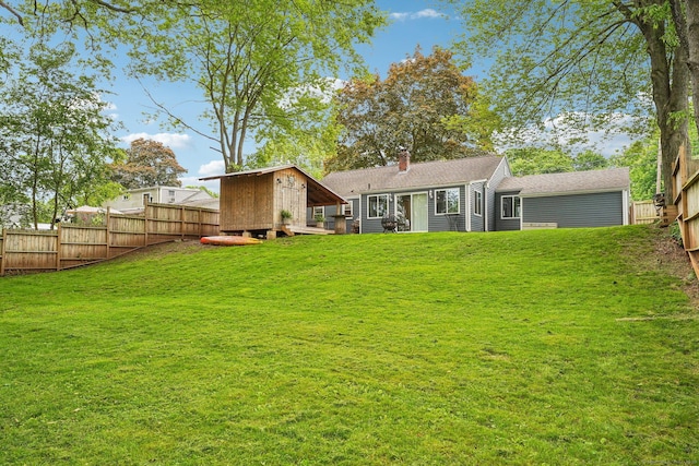 288 Robbins Ave, Newington, CT 06111 - back of house featuring a chimney