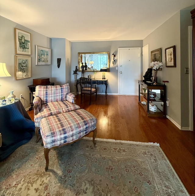 1 Strawberry Hill Ct Apt 6F, Stamford, CT 06902 - living room featuring wood finished floors and baseboards