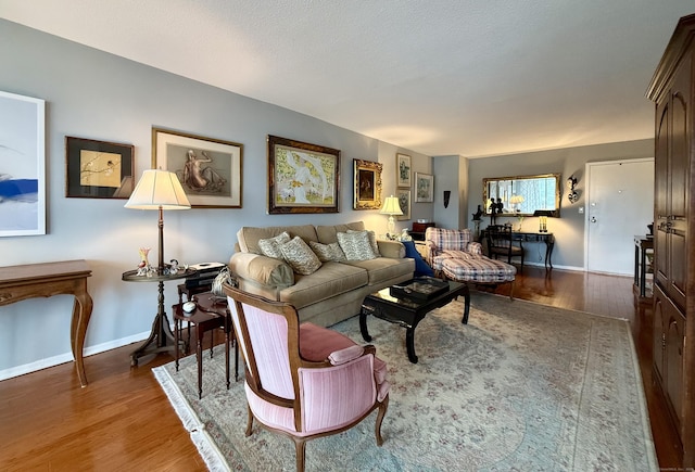 1 Strawberry Hill Ct Apt 6F, Stamford, CT 06902 - living room with wood finished floors and baseboards