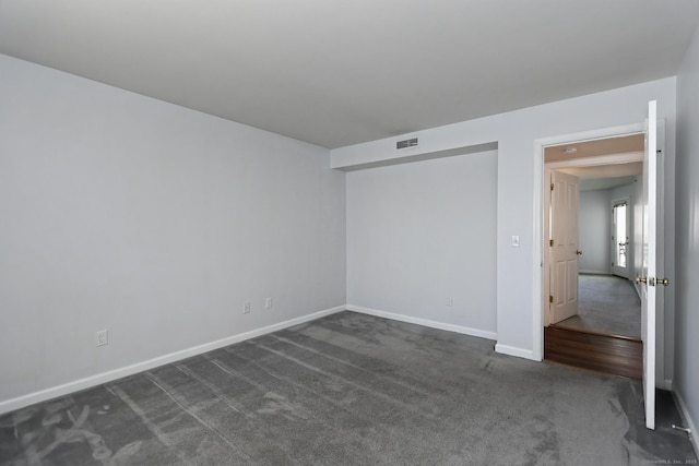 3250 Fairfield Ave Apt 302, Bridgeport, CT 06605 - unfurnished room with dark carpet and baseboards