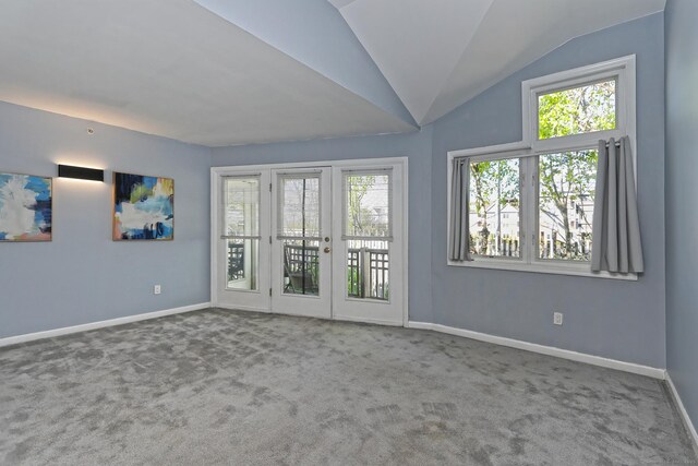 3250 Fairfield Ave Apt 302, Bridgeport, CT 06605 - empty room with carpet, baseboards, and vaulted ceiling