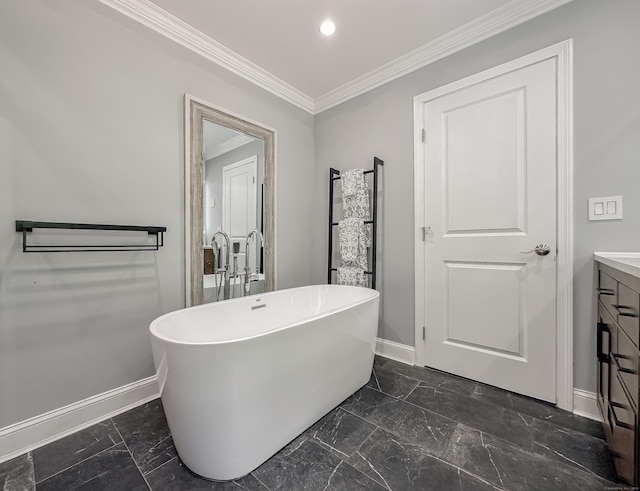 130 Wildewood Run, Bristol, CT 06010 - full bath with baseboards, marble look tile flooring, a freestanding tub, vanity, and crown molding