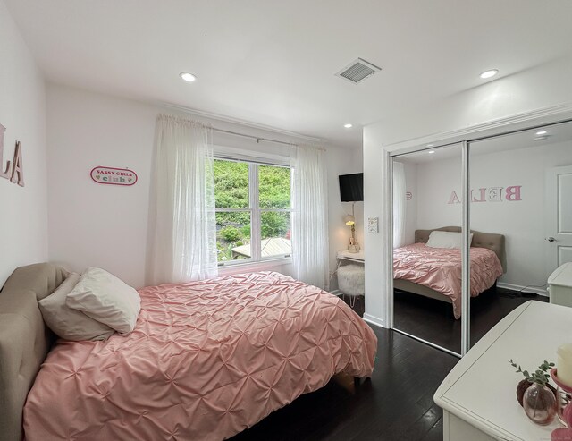 130 Wildewood Run, Bristol, CT 06010 - bedroom with dark wood-type flooring, recessed lighting, and a closet