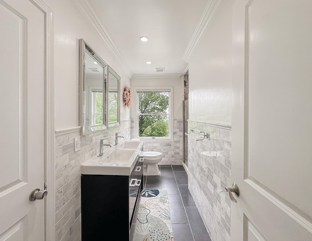 130 Wildewood Run, Bristol, CT 06010 - bathroom featuring tile walls, toilet, tile patterned floors, ornamental molding, and double vanity