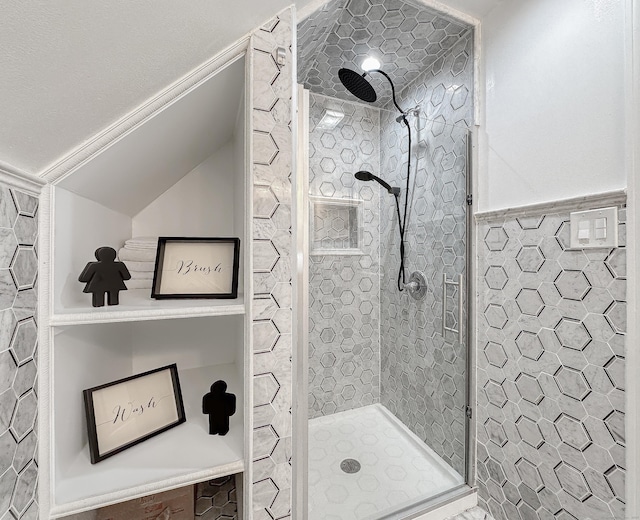 130 Wildewood Run, Bristol, CT 06010 - full bath featuring a stall shower, tile walls, and vaulted ceiling