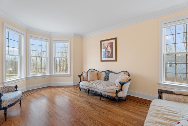 24 N Racebrook Rd, Woodbridge, CT 06525 - sitting room with plenty of natural light, baseboards, wood finished floors, and crown molding