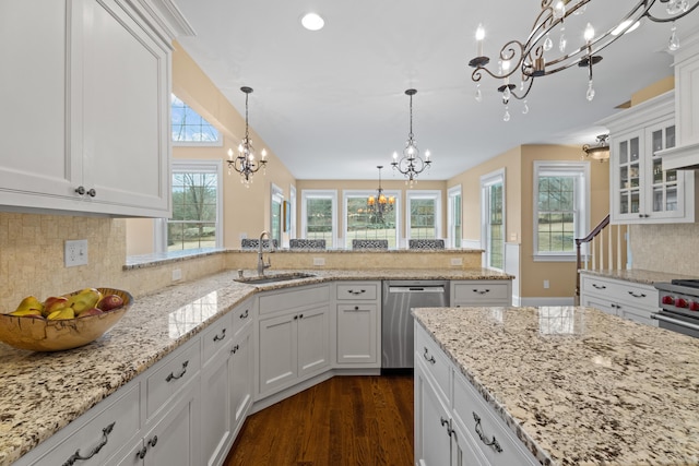 24 N Racebrook Rd, Woodbridge, CT 06525 - kitchen featuring a sink, appliances with stainless steel finishes, a chandelier, white cabinetry, and dark wood-style flooring