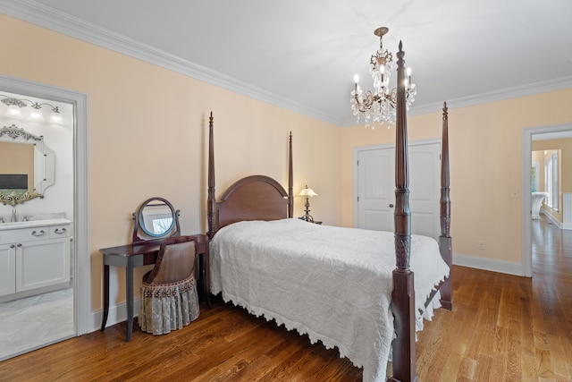 24 N Racebrook Rd, Woodbridge, CT 06525 - bedroom with crown molding, a chandelier, wood finished floors, baseboards, and connected bathroom