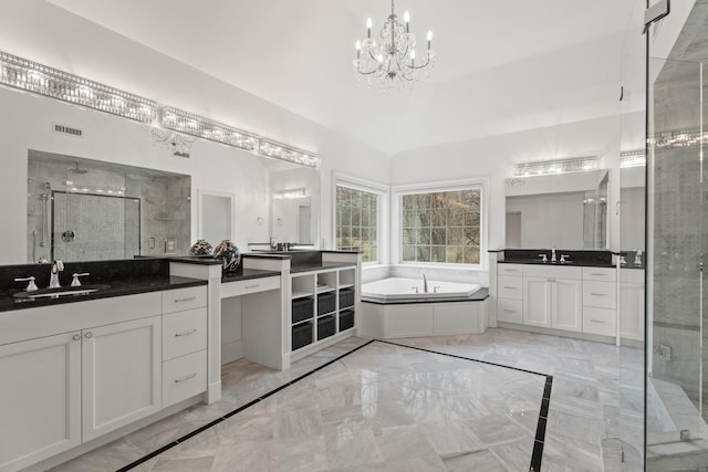 24 N Racebrook Rd, Woodbridge, CT 06525 - full bath with marble tiled floors, a chandelier, a shower stall, and two vanities