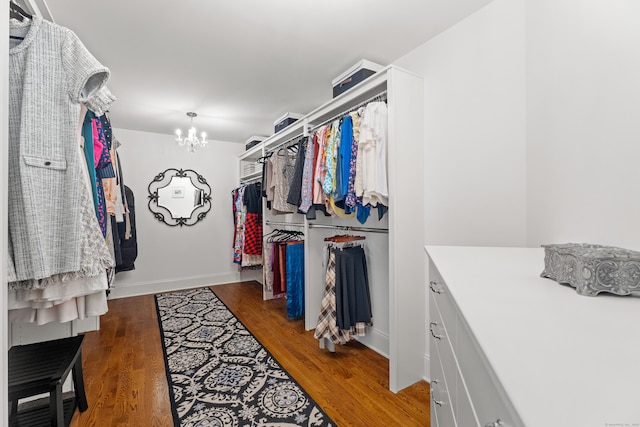 24 N Racebrook Rd, Woodbridge, CT 06525 - walk in closet featuring a chandelier and wood finished floors
