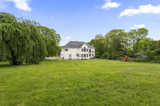 24 N Racebrook Rd, Woodbridge, CT 06525 - view of grassy yard featuring a playground