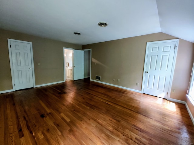 15 Packer Brook Rd, Redding, CT 06896 - unfurnished bedroom with wood finished floors, baseboards, vaulted ceiling, and ensuite bathroom