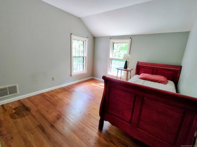 15 Packer Brook Rd, Redding, CT 06896 - bedroom with vaulted ceiling, wood finished floors, and baseboards