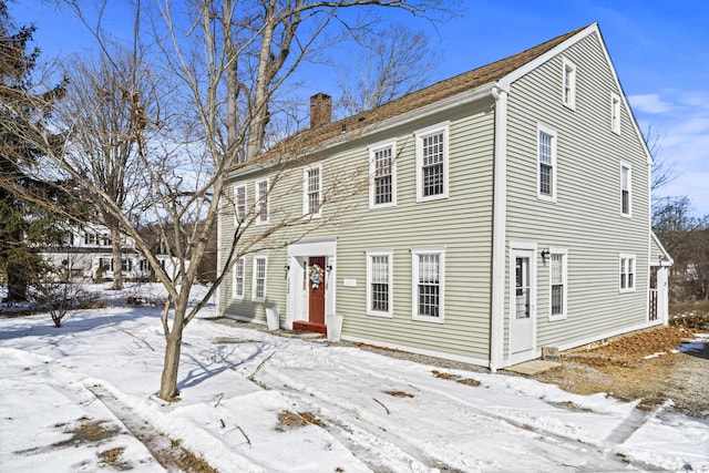 colonial home with a chimney