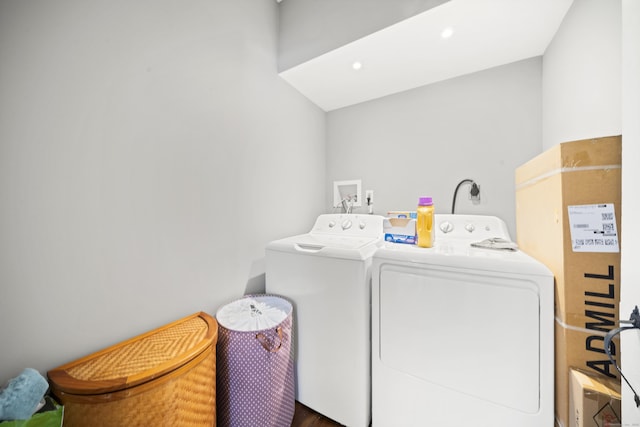 laundry room with separate washer and dryer