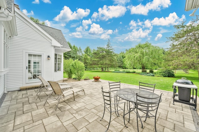 207 Great Pond Rd, Simsbury, CT 06070 - view of patio / terrace with outdoor dining space and an outdoor fire pit