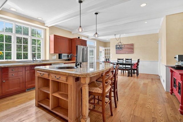207 Great Pond Rd, Simsbury, CT 06070 - kitchen with appliances with stainless steel finishes, crown molding, a wainscoted wall, beamed ceiling, and light wood-style floors