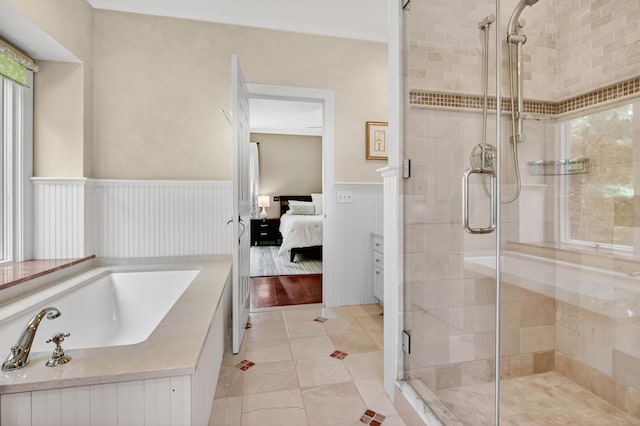 207 Great Pond Rd, Simsbury, CT 06070 - ensuite bathroom featuring a shower stall, a bath, and a wainscoted wall