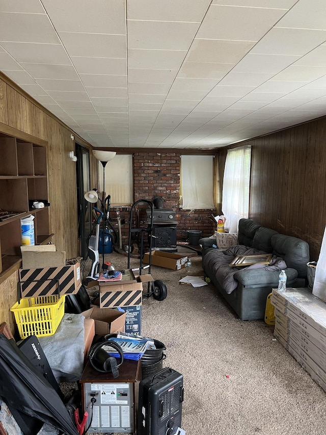 1100 Plainfield Pike, Sterling, CT 06373 - living room with wooden walls and carpet floors