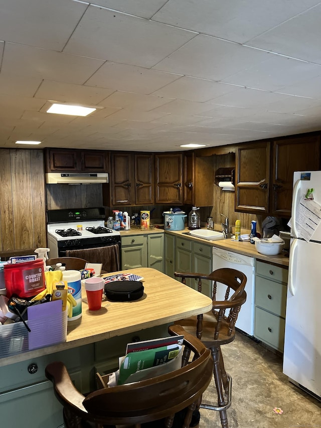 1100 Plainfield Pike, Sterling, CT 06373 - kitchen with white appliances, under cabinet range hood, a sink, concrete floors, and light countertops
