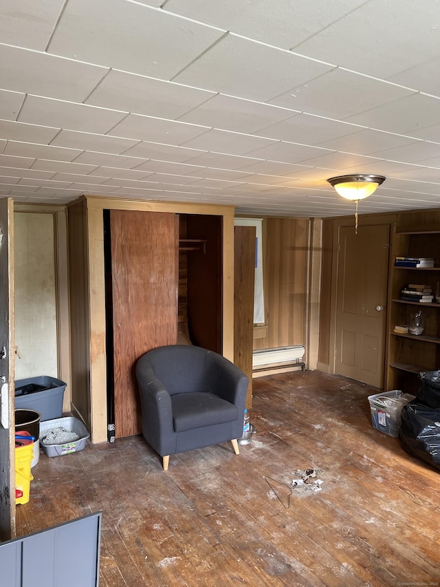 1100 Plainfield Pike, Sterling, CT 06373 - below grade area featuring hardwood / wood-style flooring and baseboard heating