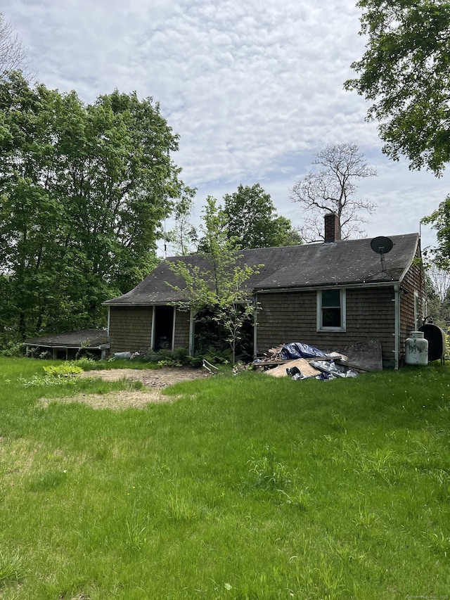 1100 Plainfield Pike, Sterling, CT 06373 - back of house with a chimney