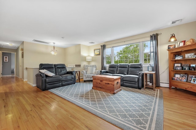 8 Brookview Ct, Bethel, CT 06801 - living room featuring light wood-style flooring and a baseboard radiator