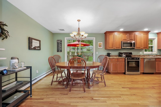 8 Brookview Ct, Bethel, CT 06801 - kitchen featuring appliances with stainless steel finishes, a chandelier, light wood-style flooring, recessed lighting, and decorative light fixtures