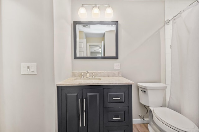 8 Brookview Ct, Bethel, CT 06801 - bathroom with vanity, toilet, curtained shower, wood finished floors, and baseboards