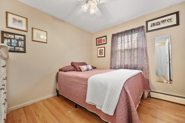 8 Brookview Ct, Bethel, CT 06801 - bedroom featuring light wood finished floors, baseboards, ceiling fan, and a baseboard radiator