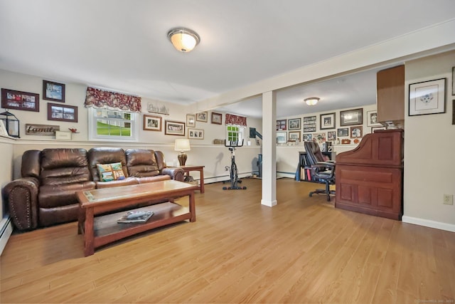 8 Brookview Ct, Bethel, CT 06801 - living room with light wood finished floors, healthy amount of natural light, a desk, and baseboards
