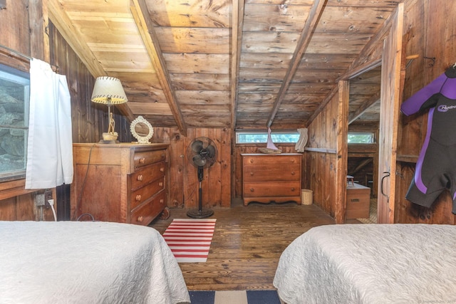 bedroom with wooden ceiling, wood finished floors, wooden walls, and vaulted ceiling