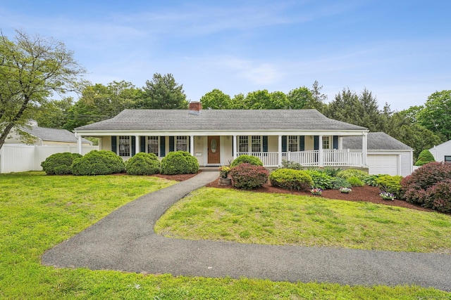 81 Edward St, Newington, CT 06111 - single story home featuring a porch, a chimney, and a detached garage