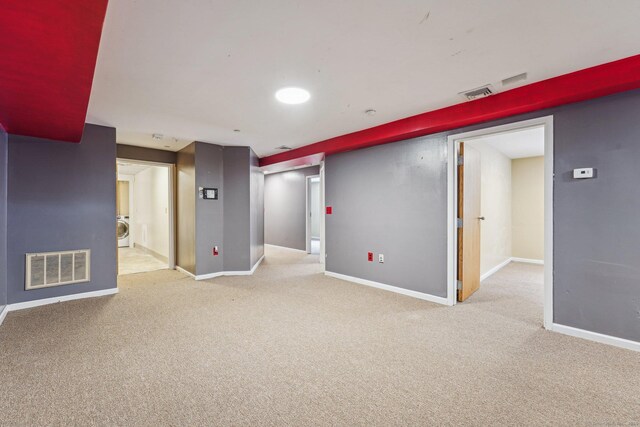 81 Edward St, Newington, CT 06111 - finished below grade area featuring washer / dryer, carpet floors, and baseboards
