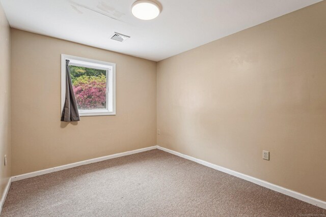 81 Edward St, Newington, CT 06111 - carpeted spare room featuring baseboards