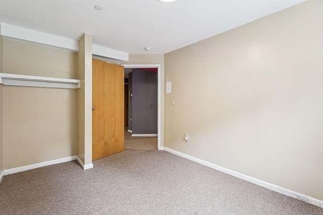 81 Edward St, Newington, CT 06111 - unfurnished bedroom featuring a closet, carpet floors, and baseboards